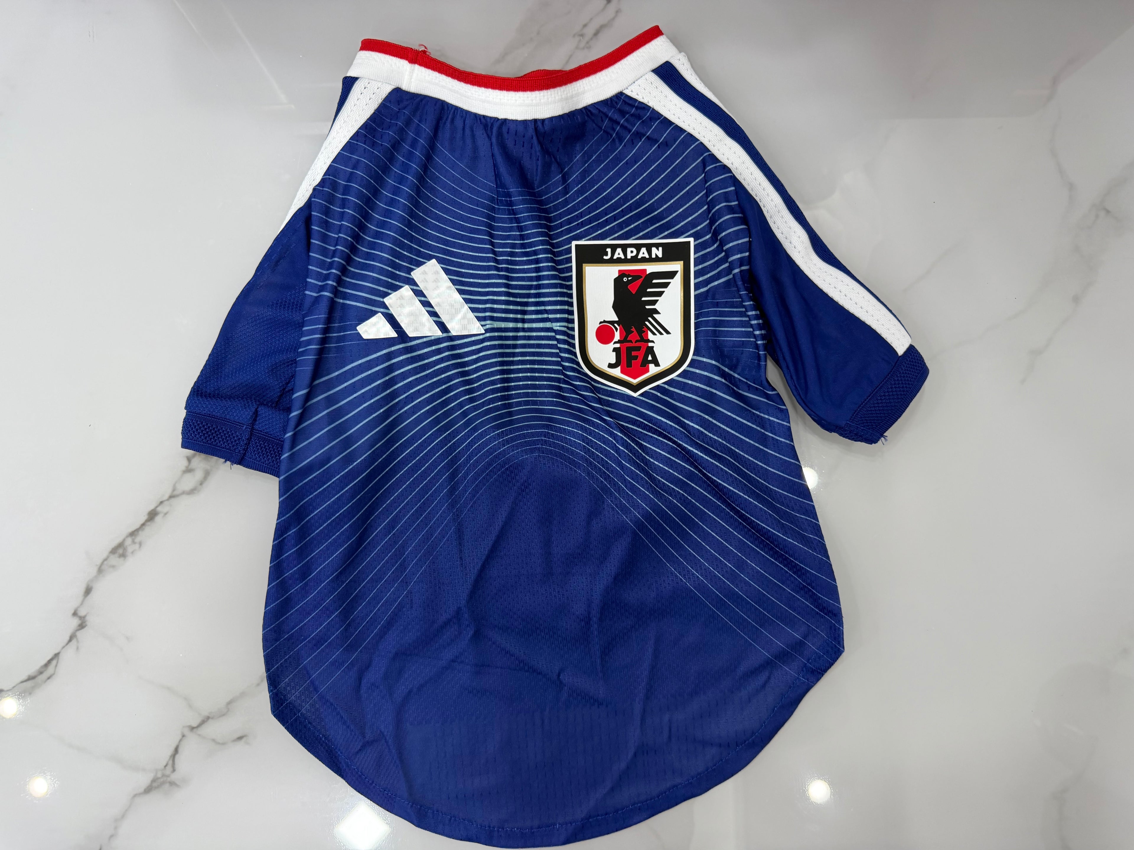 Jersey Mascota Japón Local 2026
